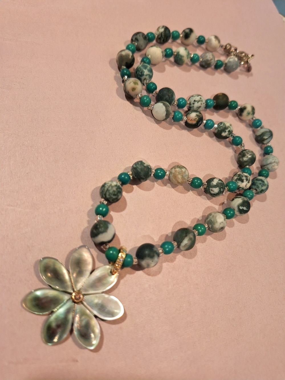 Artisan Crafted Beaded Necklace With Floral Shell